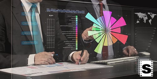 Businessmen Analyze Data on Futuristic Screen