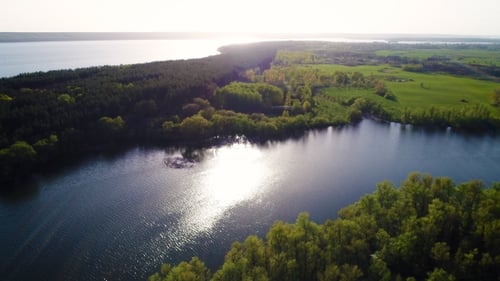 Flying Over the Beautiful Spring River. Aerial Camera Shot. Ukraine.