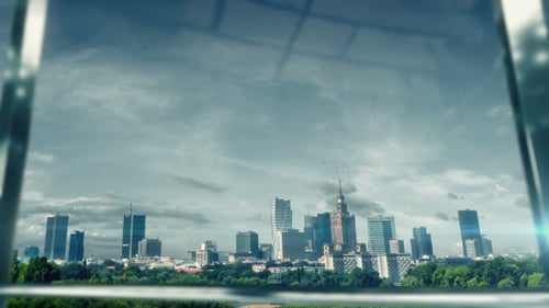 Business People Shaking Hands in Front of City Skyline