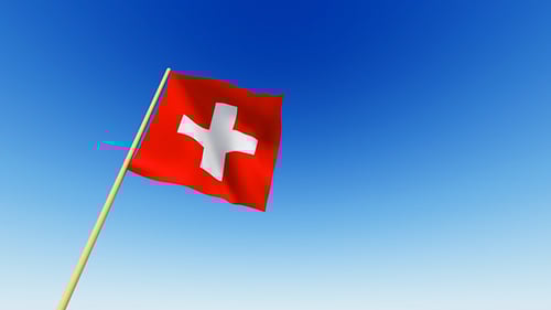 Swiss Flag Waving against Blue Sky