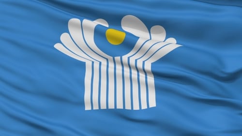 Abstract Blue and White Flag with Yellow Emblem Waving