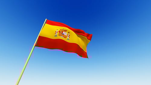 Realistic Waving Spanish Flag on Clear Blue Sky