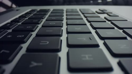 Laptop Keyboard Close Up Dolly Out