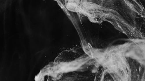 Abstract Wisps of White on Black Background