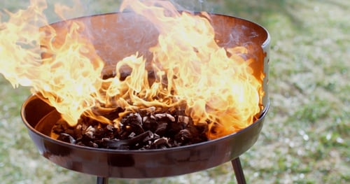 Flaming Charcoal Briquettes in a BBQ