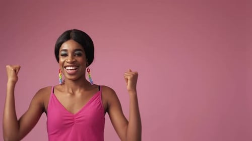 Excited Woman Cheering and Pumping Fists
