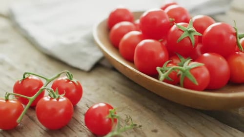 Bright Red Cherry Tomatoes on Wooden Table