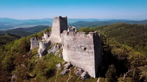 Abandoned Ruined Castle in Hills.