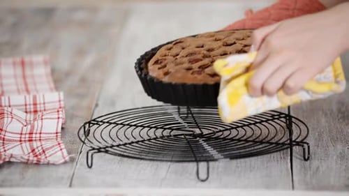 Fresh Cherry Pie Cooling on Rack in Kitchen