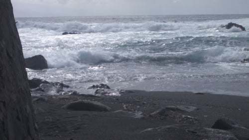 Waves Breaking on a Beach in the Evening