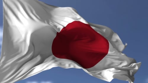 Realistic Waving Japan Flag Animation Against Blue Sky