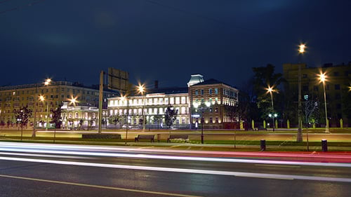 Traffic Light Streaks in Urban Cityscape at Night