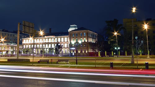 Urban Building at Night with Time Lapse Traffic