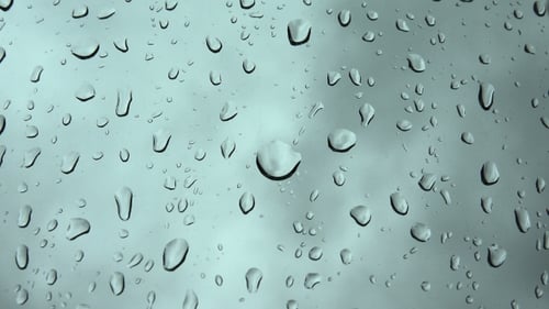 Rain Droplets on a Window Close Up