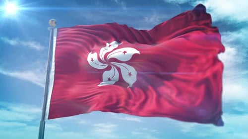 Hong Kong Flag Waving in Blue Sky with Sun Flare