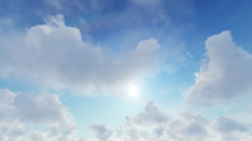 Floating White Clouds in Blue Sky with Bright Sun