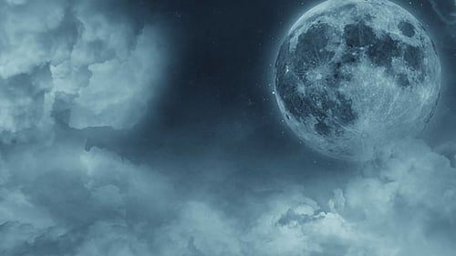 Dramatic Full Moon with Moving Clouds at Night