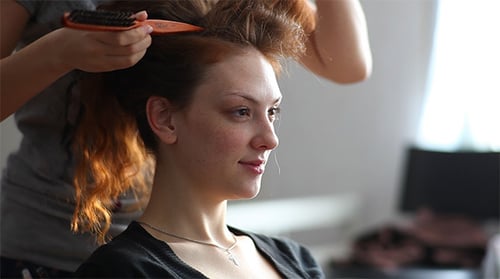 Woman Getting Her Hair Styled Indoors