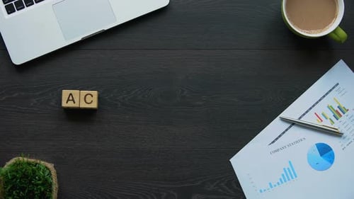 Action Plan Blocks on Desk Overhead