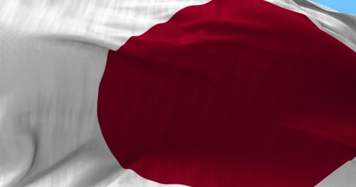 Realistic Japan Flag Waving on a Sunny Day
