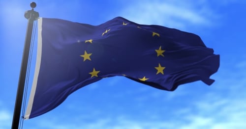 Realistic European Union Flag Waving in Clear Blue Sky