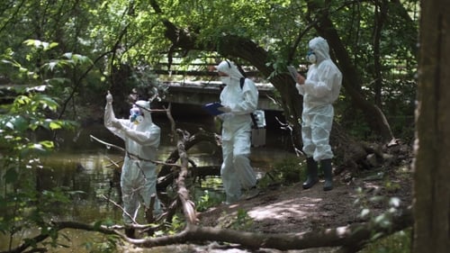 Scientists in Hazmat Suits Test Water Quality