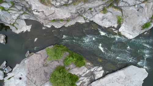 Aerial Footage. Fly Over River Rapids on Rocks