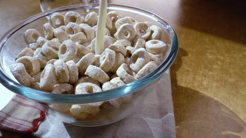 Pouring Milk into a Bowl of Cereal