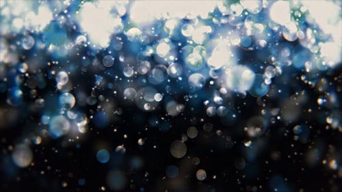 Shimmering Blue Bokeh Light Particles