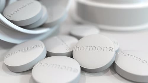 Pills with Stamped HORMONE Text