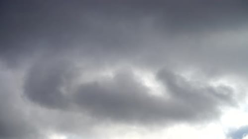 Storm Clouds Rolling Across Overcast Sky