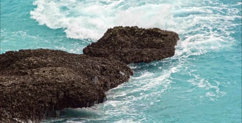 Waves In Sea And Rocks