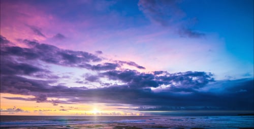 Fiery Sunset In The Blue Sky Over The Ocean
