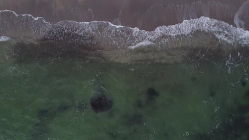 Aerial view drone flies near the sea. Wide view of the water. Beautiful blue sea.