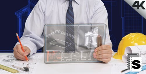 Architect Using Tablet to Review Building Plans
