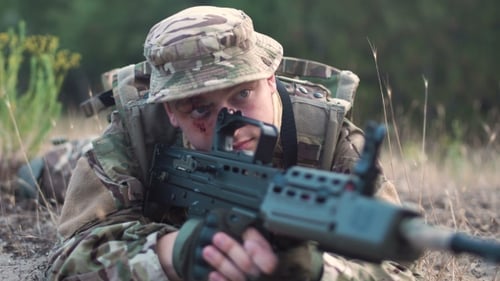 Soldier on Ground Aiming with Gun
