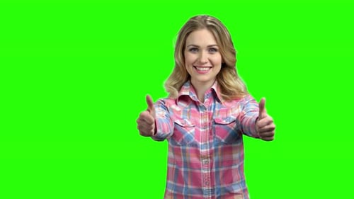 Woman Showing Two Thumbs Up on Green Screen