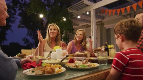 Family Meal Around the Table at Night