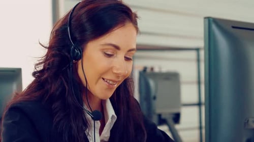 Business People Wearing Headset Working in Office