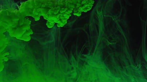 Green Ink Flowing in Water