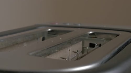 Toasting Slices of Bread in a Toaster