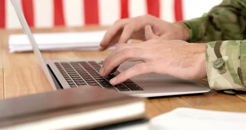 Soldier using laptop
