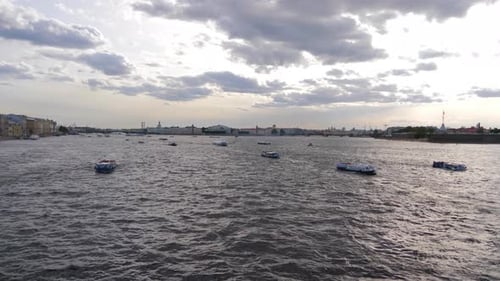 View of Neva River in St. Petersburg, Russia, Tourist Boats Float on the River, Buildings Near the