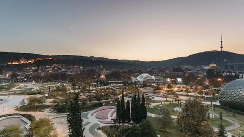 Tbilisi, Georgia. Modern Urban Night Cityscape. Evening Night Scenic View Of City Center In Night