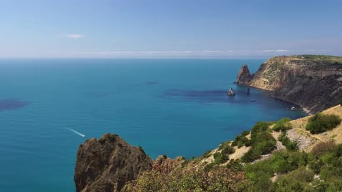 Aerial Panoramic View of Seascape with Crystal Clear Azure Sea and Rocky Shores