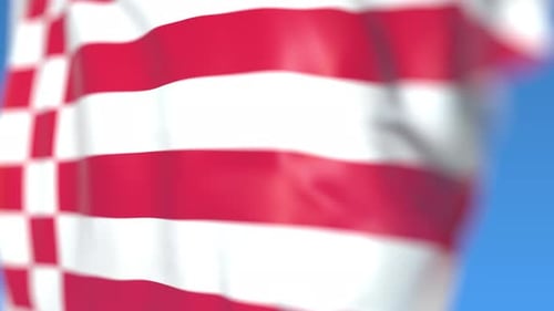 Waving Flag Animation with Red and White Geometric Patterns