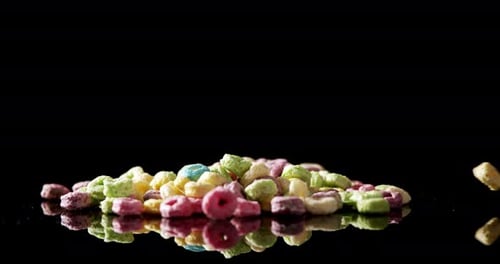 Froot loops on black background 4k