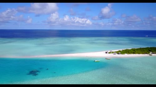 Aerial top down nature of tranquil island beach vacation by blue sea with white sand background of a