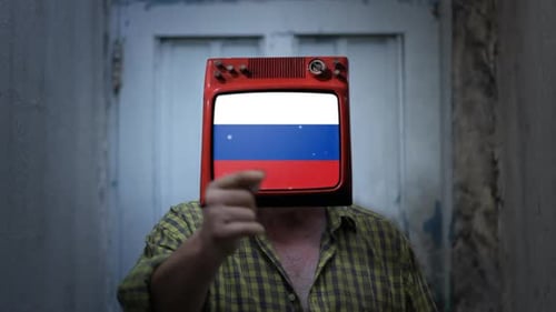 Figure with Television Head Displays Russian Flag