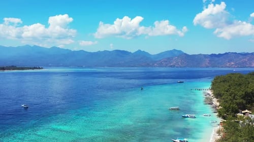 Aerial top down panorama of relaxing seashore beach holiday by blue sea and white sand background of